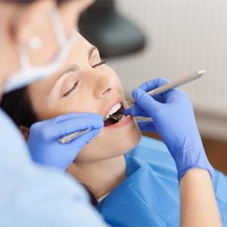 Woman getting dental work with IV dental sedation in Laguna Nigel  