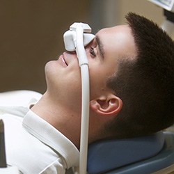 Man relaxing with nitrous oxide dental sedation in Laguna Niguel 